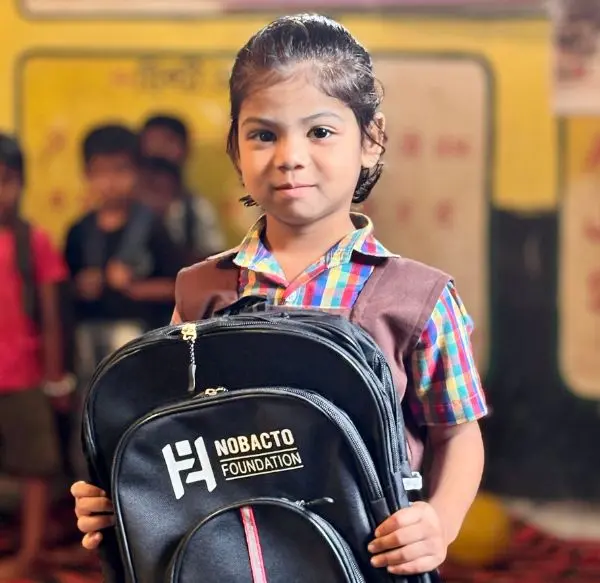 School Bags Distributed to Underprivileged Children at Ruabandha Bustee — NOBACTO FOUNDATION Action 07