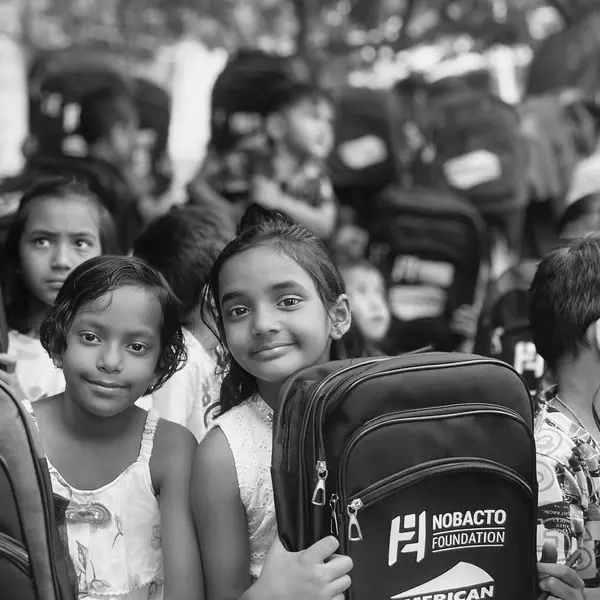 Children with school bags at Maya Nagri, Bhilai